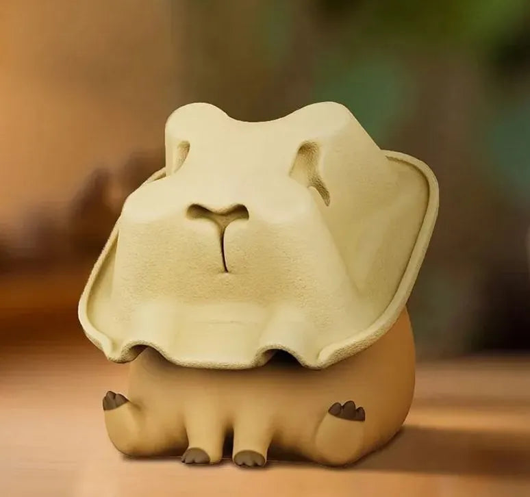 Cup Holder Capybara figure hiding beneath a cup holder lid from the Luck Moai Capybara Series Blind Box
