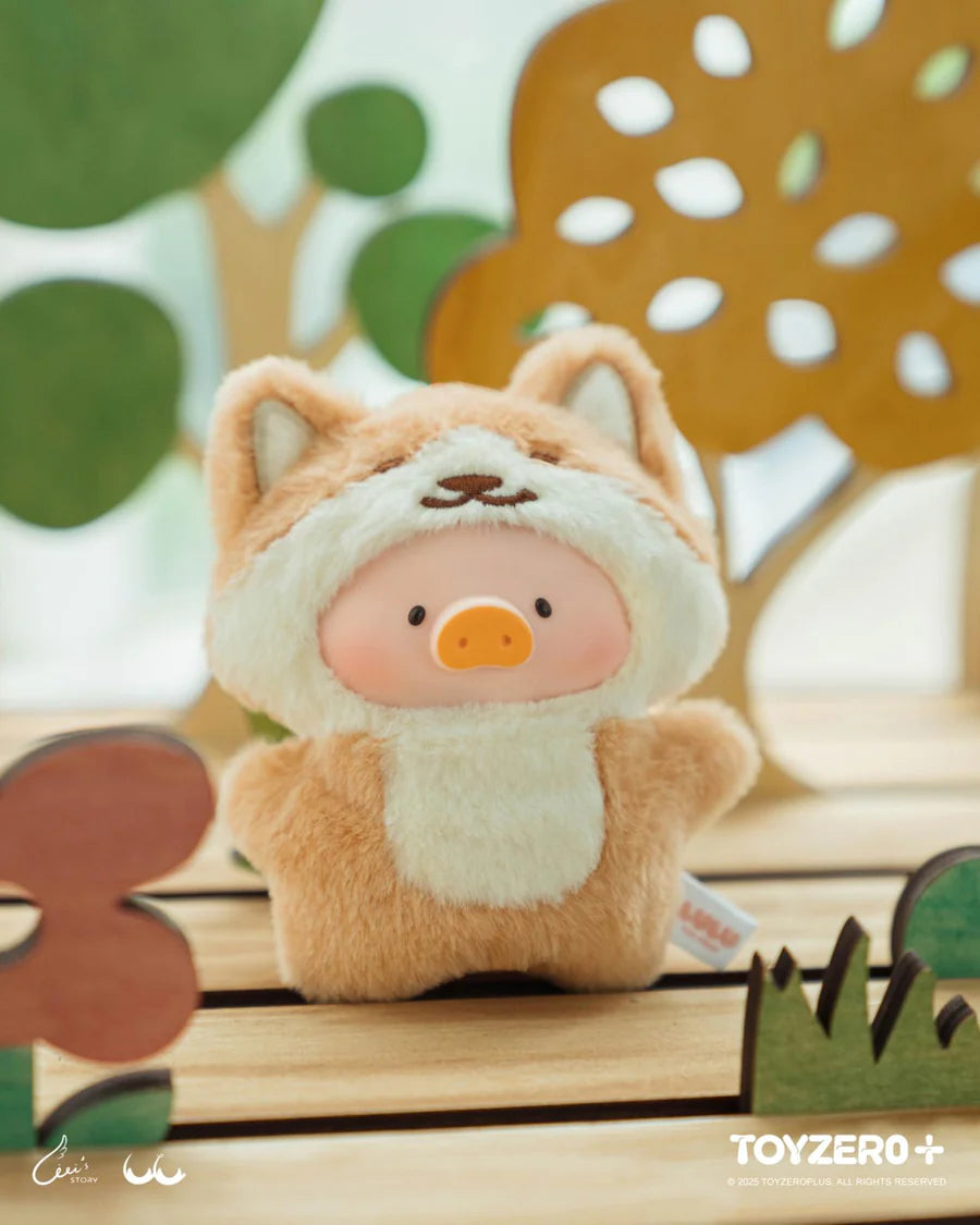LuLu the Piggy plush keychain dressed as a fox with white chest fur