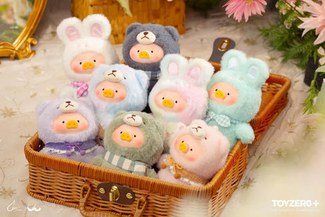 Basket display of LuLu the Piggy Joyful Time Series plush keychains with bunny and teddy costumes