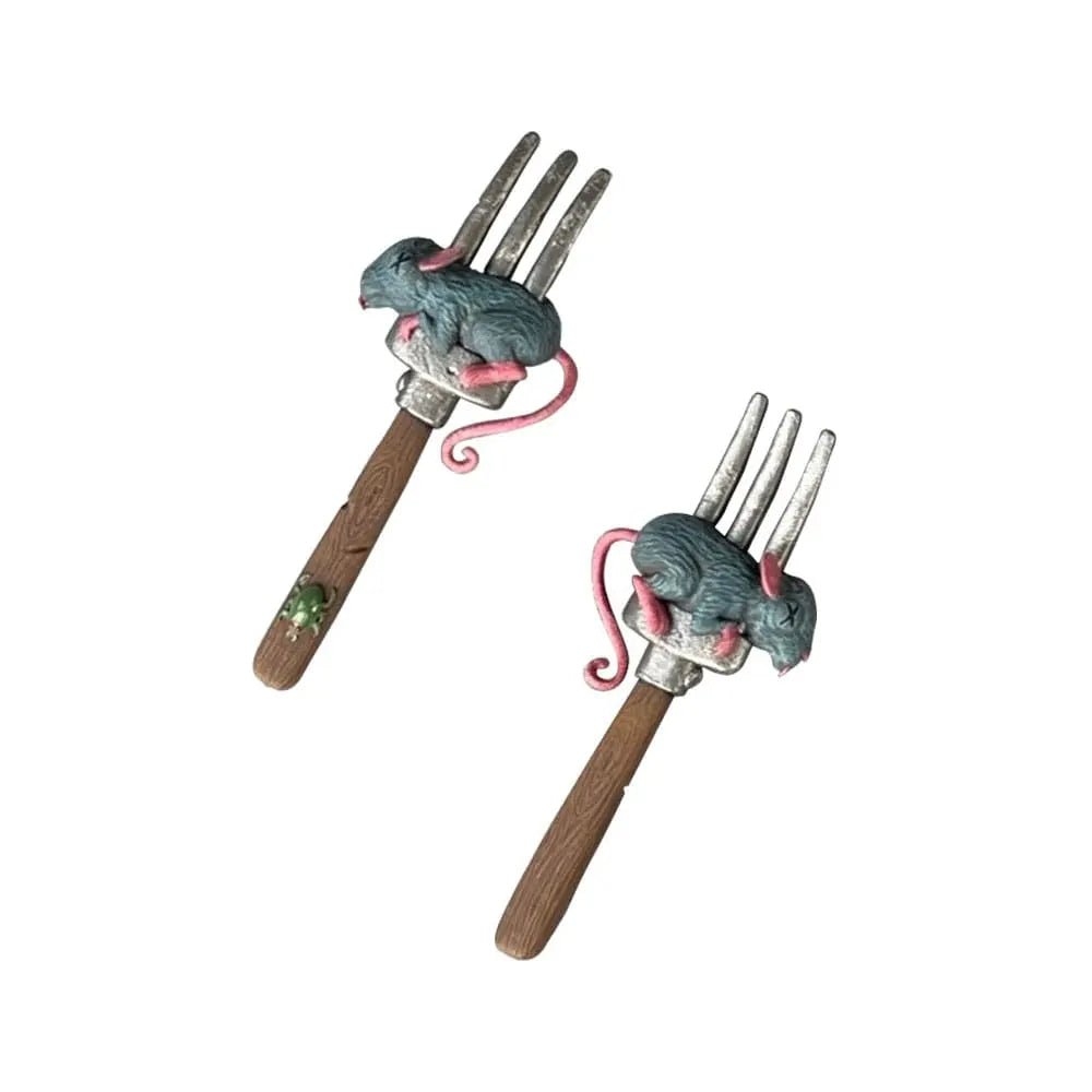 Swine Sucker with dinner fork and rat accessory posed in hand.