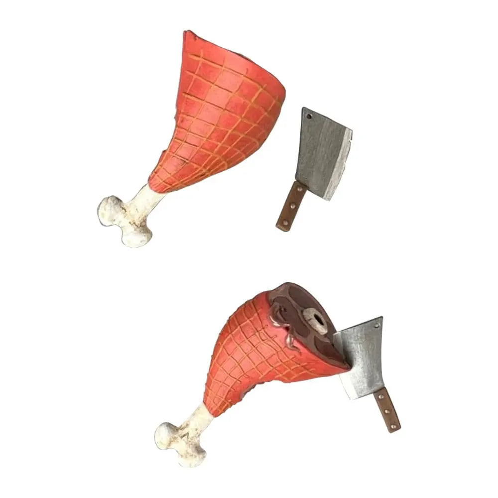 Ham and meat cleaver accessory from Madballs Swine Sucker figure, includes bone and bite details.