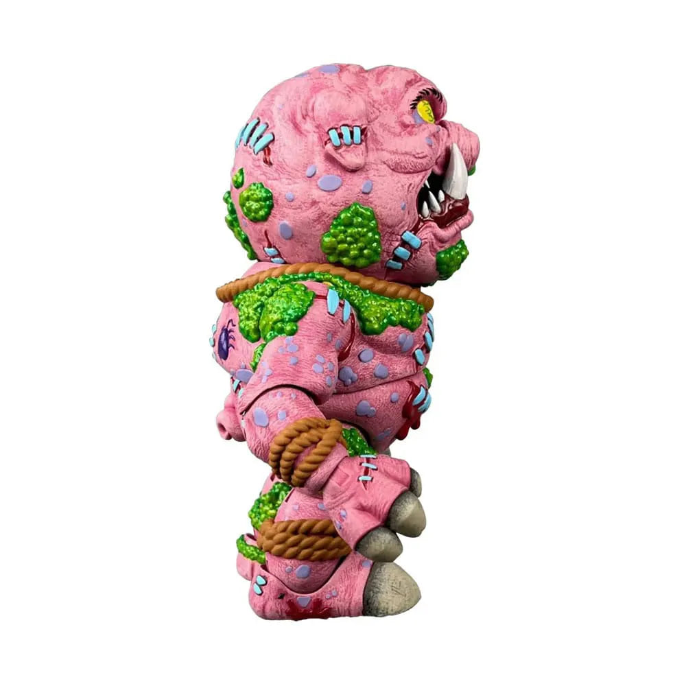 Side profile of Madballs Swine Sucker figure displaying sculpted boils, stitches, and rope restraints.