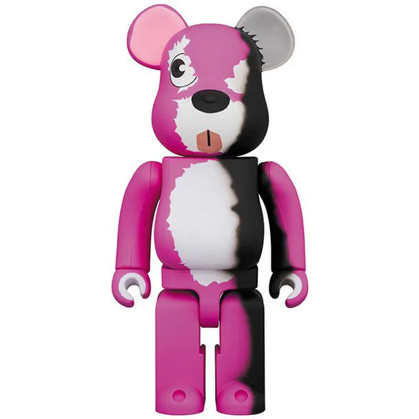 Front view of Medicom Toy Bearbrick 1000% Pink Bear from Breaking Bad, showing mismatched eyes, torn fur, and distressed pink and black design.