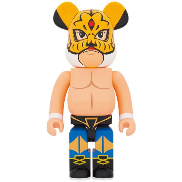 Medicom Toy Bearbrick 1000% Tiger Mask Pro Wrestler First Generation figure with tiger mask, nude chest, and blue wrestling tights.