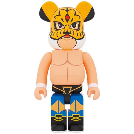 Medicom Toy Bearbrick 1000% Tiger Mask Pro Wrestler First Generation figure with tiger mask, nude chest, and blue wrestling tights.