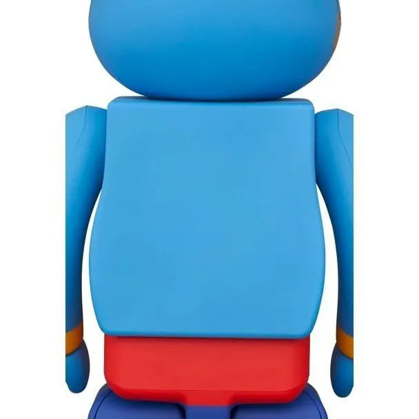 Back view of Medicom Toy Bearbrick 400% Genie from Disney’s Aladdin, highlighting red belt and smooth blue finish.