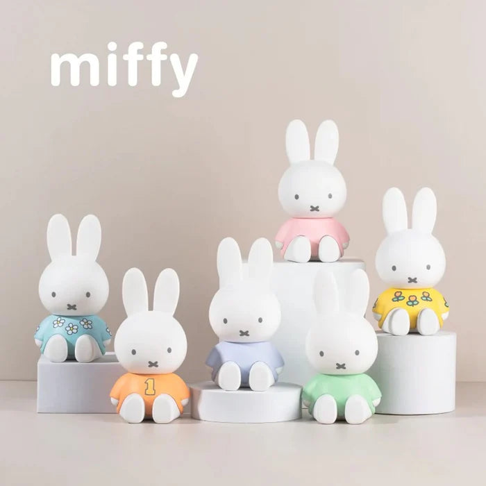 Complete lineup of Miffy Phone Stand Series Blind Box figures featuring colorful outfits and collectible phone stand designs