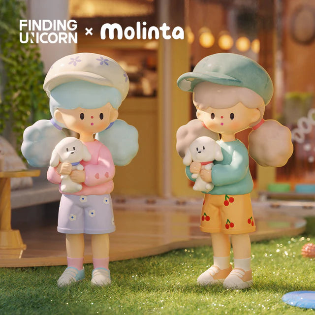 Molinta figures holding small puppy companions outdoors in a garden scene