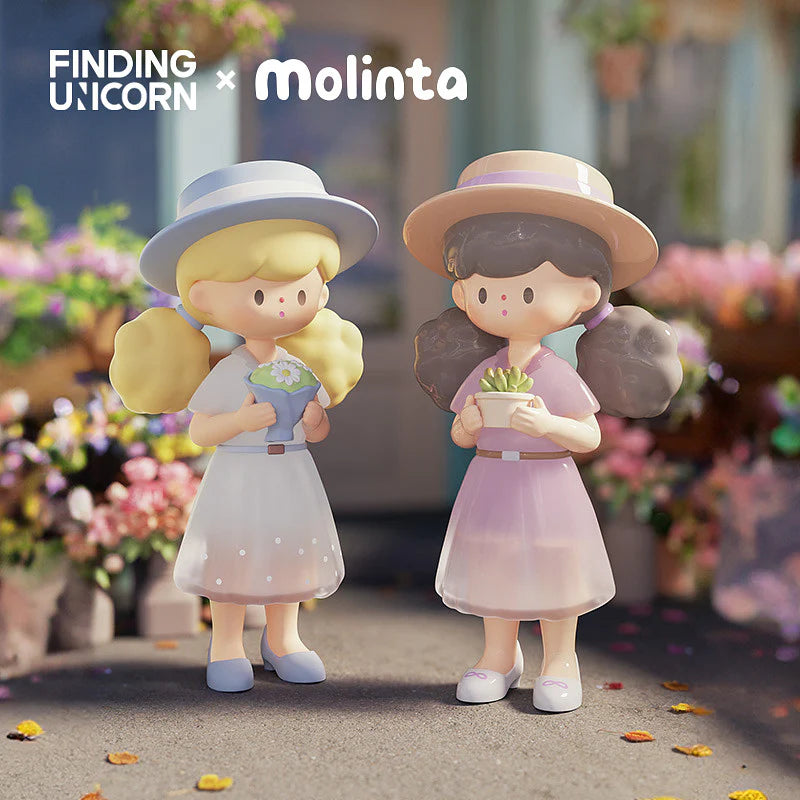 Molinta chase figures in pastel translucent dresses holding spring flowers.