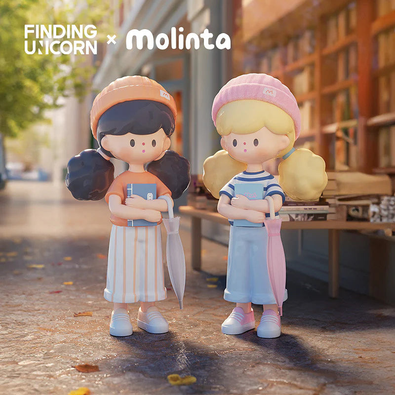 Two Molinta Spring City Wandering vinyl figures with umbrellas and casual outfits.