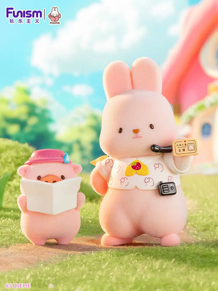 Momo Bunny Strawberry Town figure with pig friend holding map.