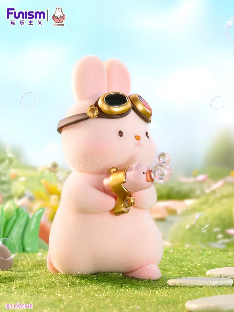Momo Bunny Strawberry Town figure wearing goggles and blowing bubbles.