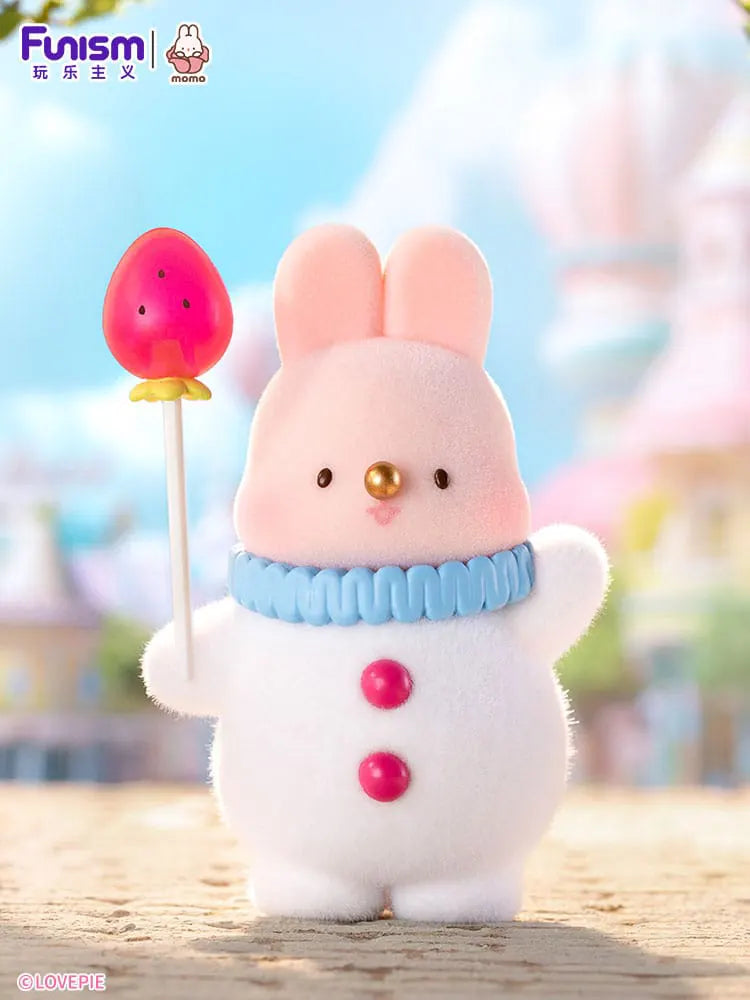 Momo Bunny Strawberry Town figure in snowman outfit with strawberry lollipop.