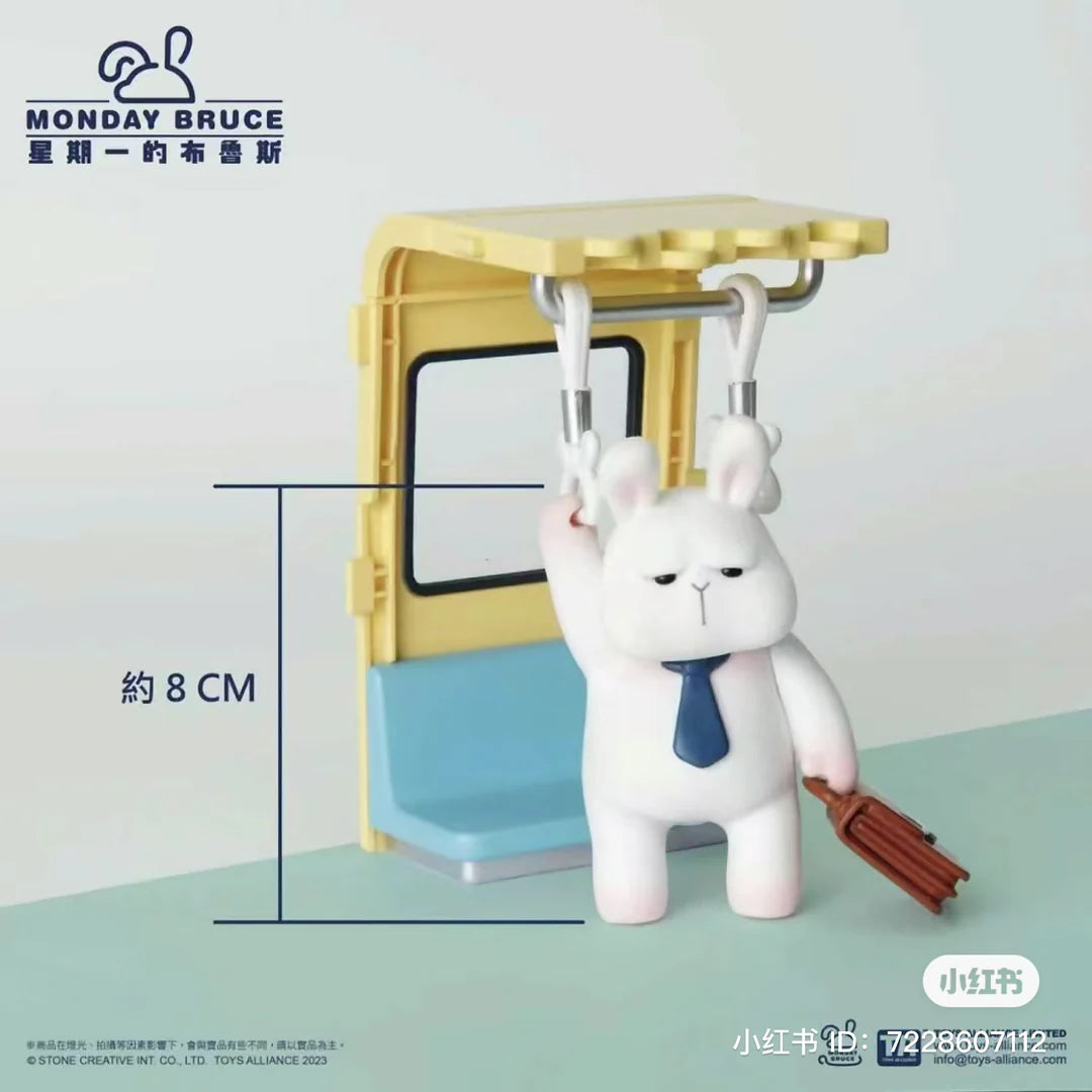 Monday Bruce figure standing in subway holding onto straps