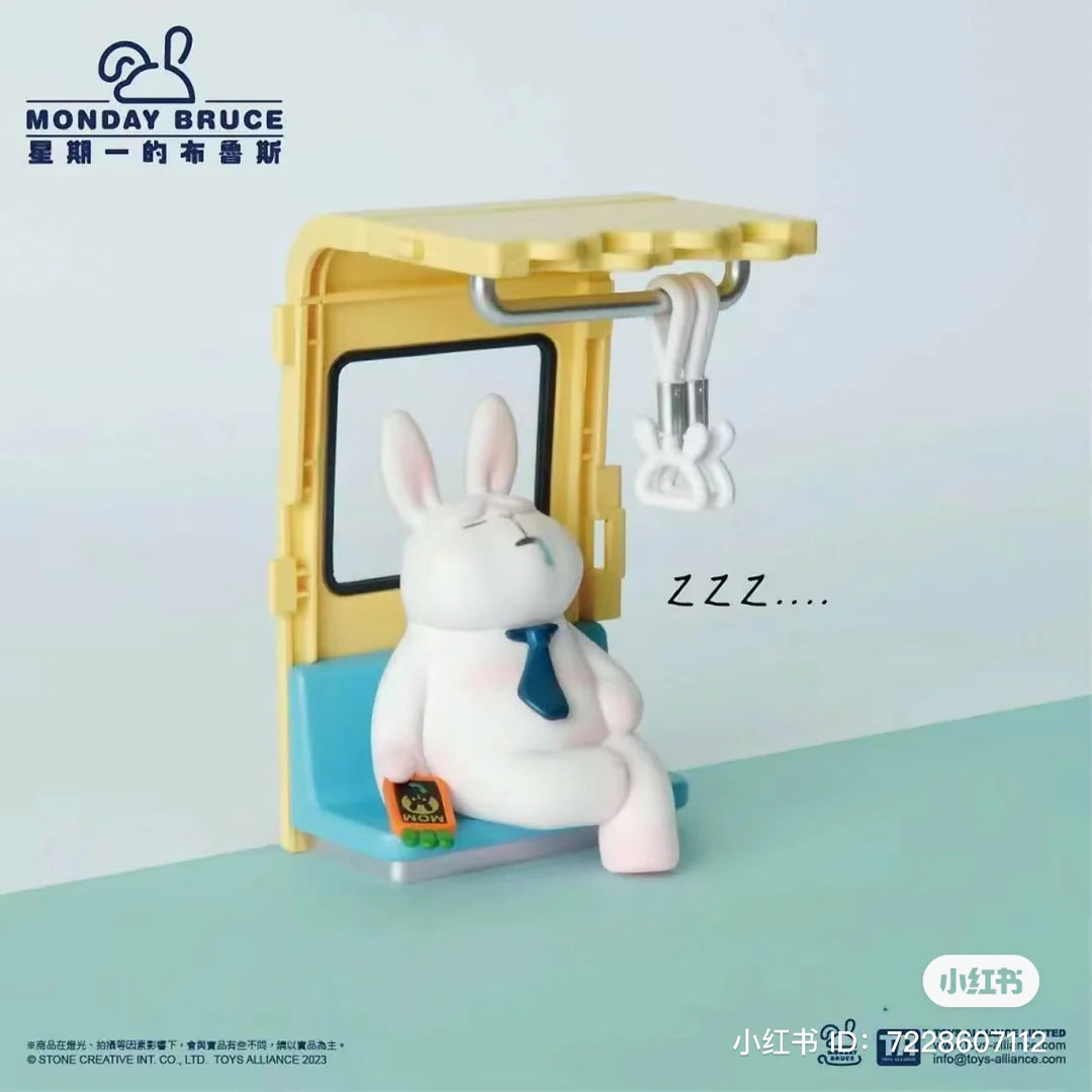 Monday Bruce bunny figure sleeping in subway seat