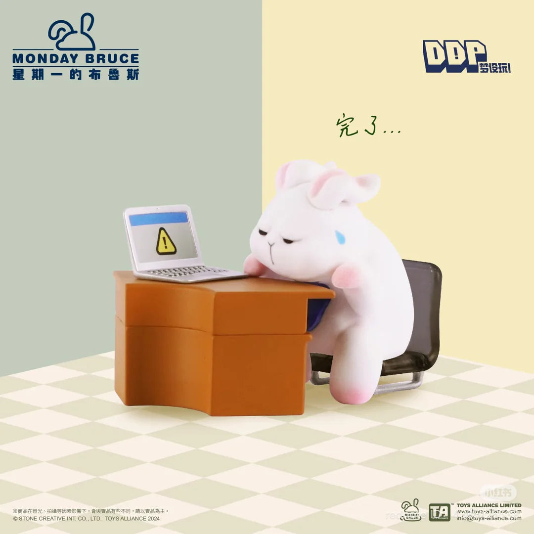 Monday Bruce Series 6 bunny exhausted, resting on a laptop at a desk.
