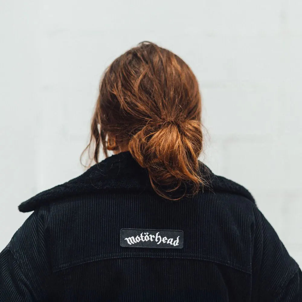 Motörhead logo patch applied on the back of a black jacket