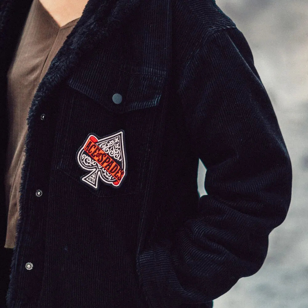 Close-up of Ace of Spades Motörhead patch applied on jacket pocket