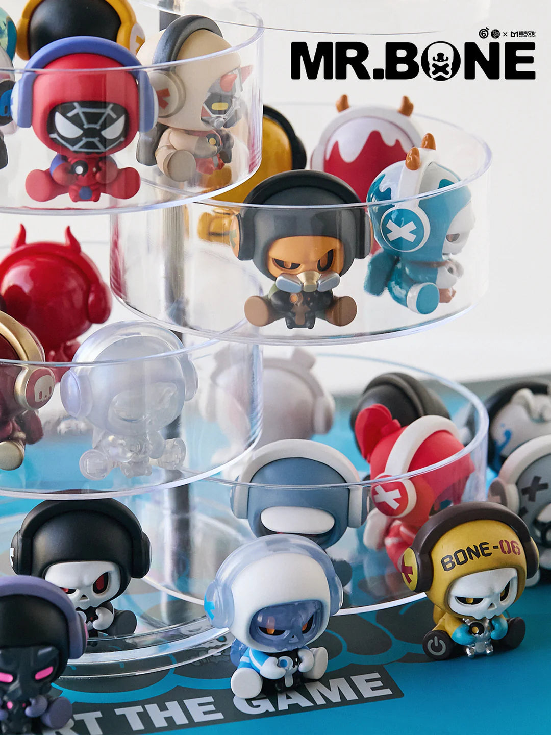 Close-up of Baby Bone blindbox figures on transparent stands, highlighting different designs.