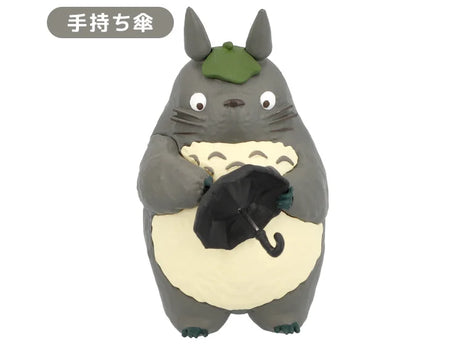 Totoro figure holding an umbrella with leaf hat from My Neighbor Totoro blindbox