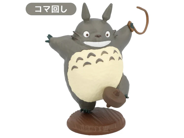 Totoro spinning a wooden top figure from My Neighbor Totoro blindbox collection