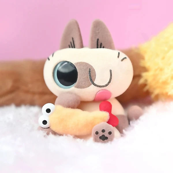 Cute winking Azukisan cat with tongue out holding yellow plush toy