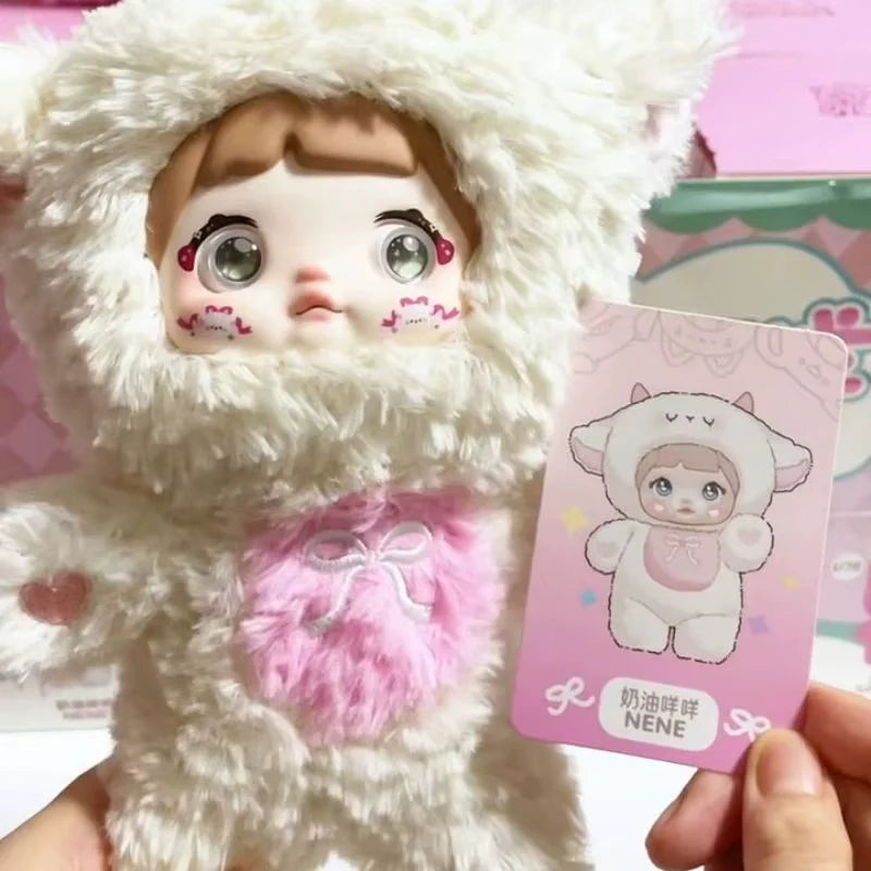 Creamy Sheep Nene plush keychain with fluffy costume and collector card.
