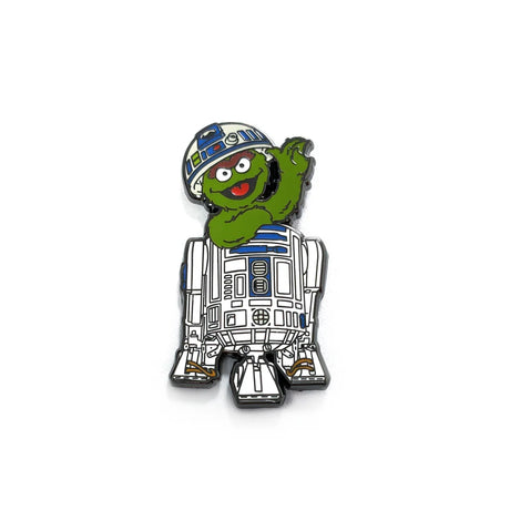Hard enamel pin featuring green monster inside space droid