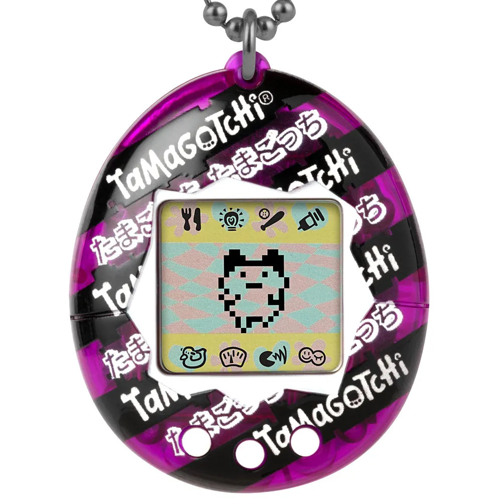 Close-up of Japanese Ribbon Tamagotchi showing digital pet on screen.