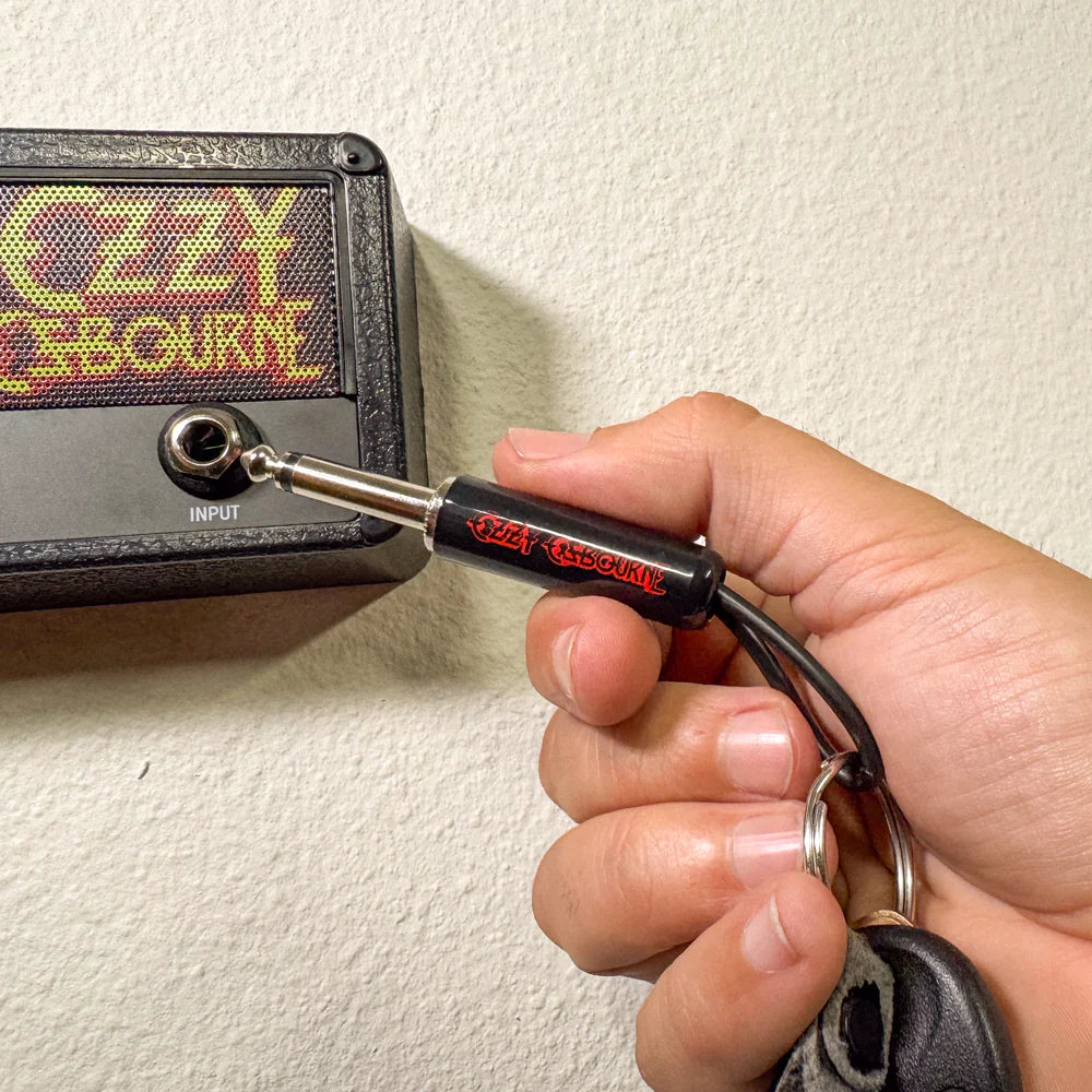 Ozzy Osbourne guitar plug keychain plugged into Jack Rack holder