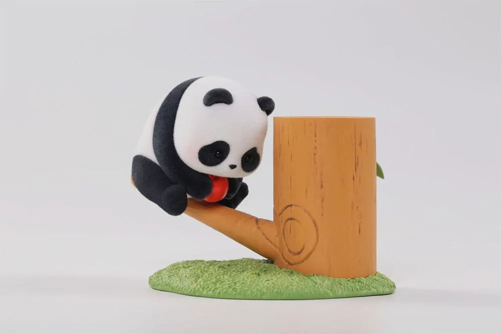 Panda holding a red fruit on a branch in the Fruit Tree Climbing series