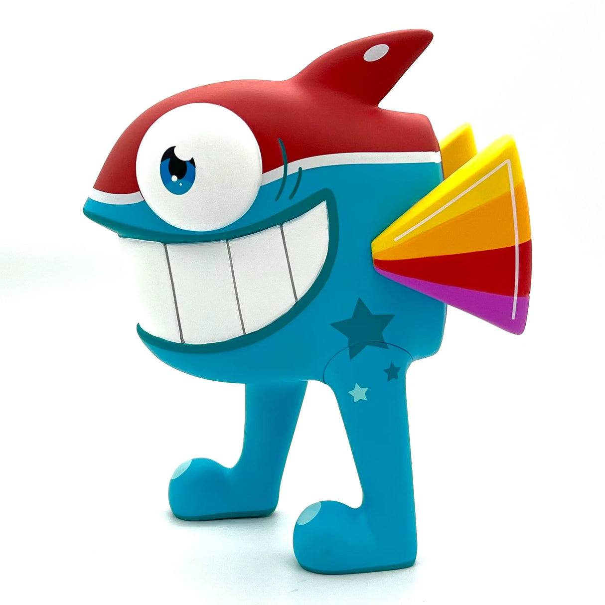 Pez The Walking Fish vinyl figure in “Tropical” edition with rainbow fins and a giant smile