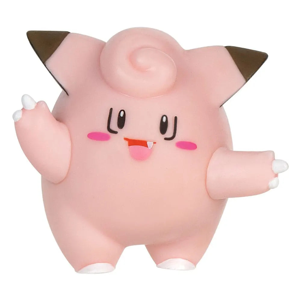Close-up of Clefairy Pokémon figure with a happy expression and raised arms.
