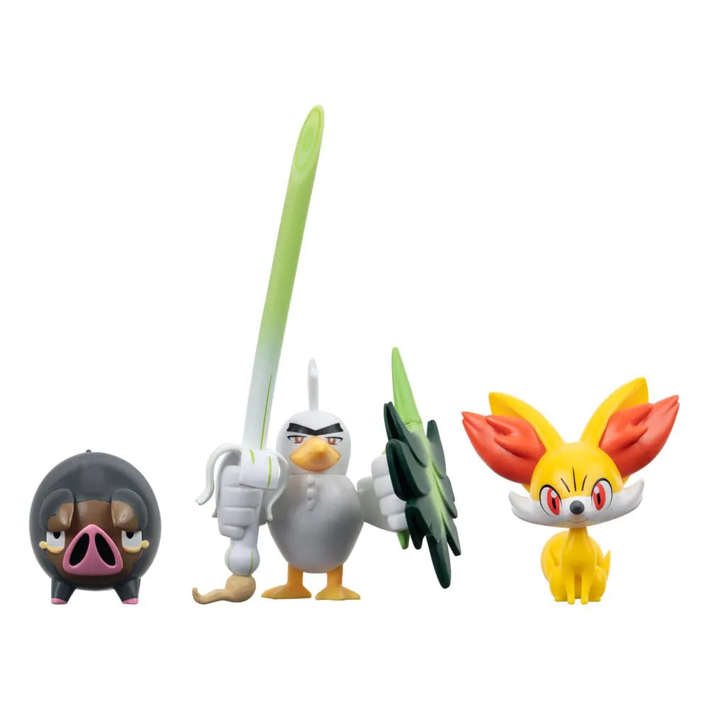 Close-up of Pokémon figures Fennekin, Lechonk, and Sirfetch’d standing together
