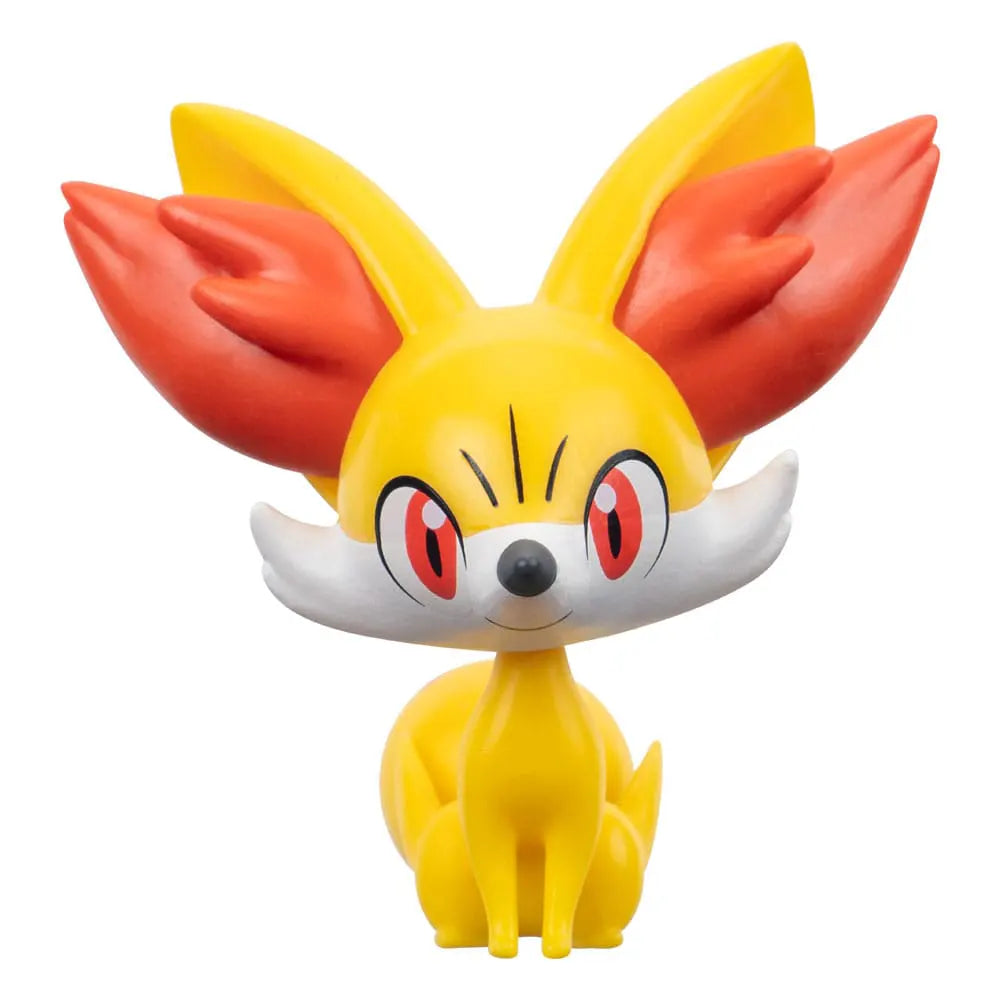 Front view of Fennekin Pokémon figure with large orange ears and yellow body