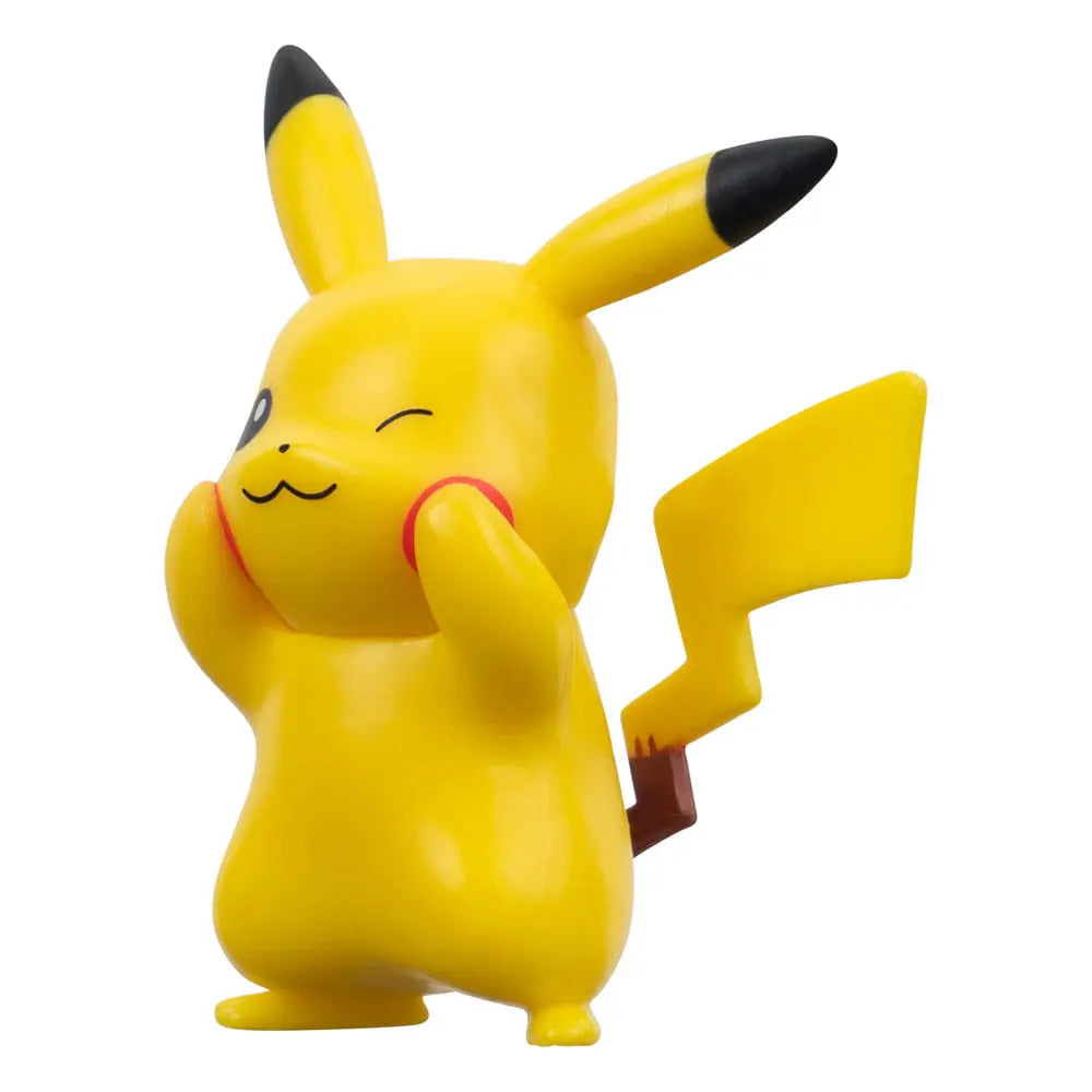 Close-up front view of Pikachu #8 Pokémon figure with winking expression.
