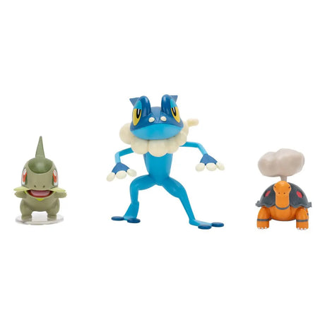 Torkoal, Axew, and Frogadier Pokémon figures standing side by side.