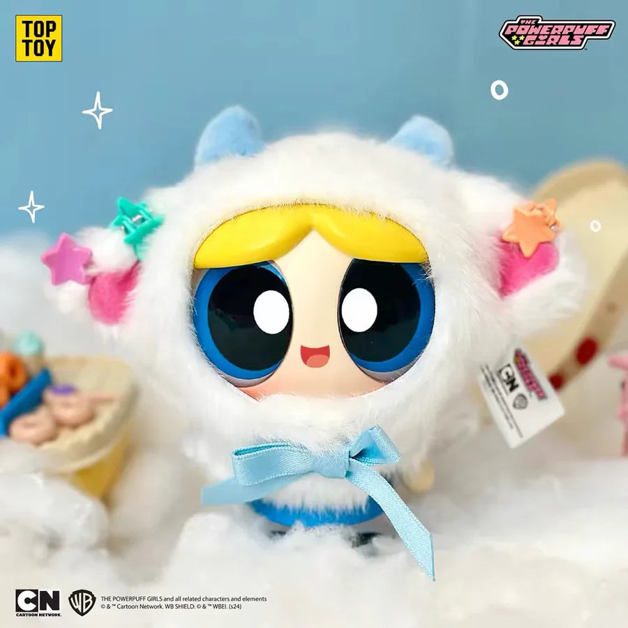 Bubbles Powerpuff Girl figure with fluffy white cape and blue bow