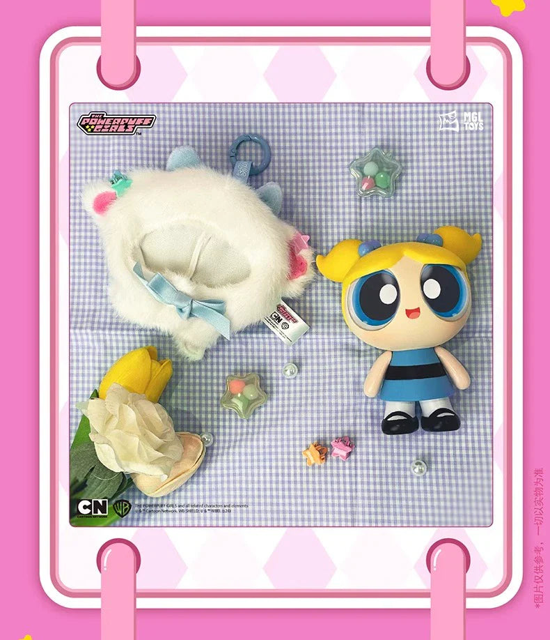 Close-up of Bubbles from the Powerpuff Girls in fluffy cape with bow and star charms