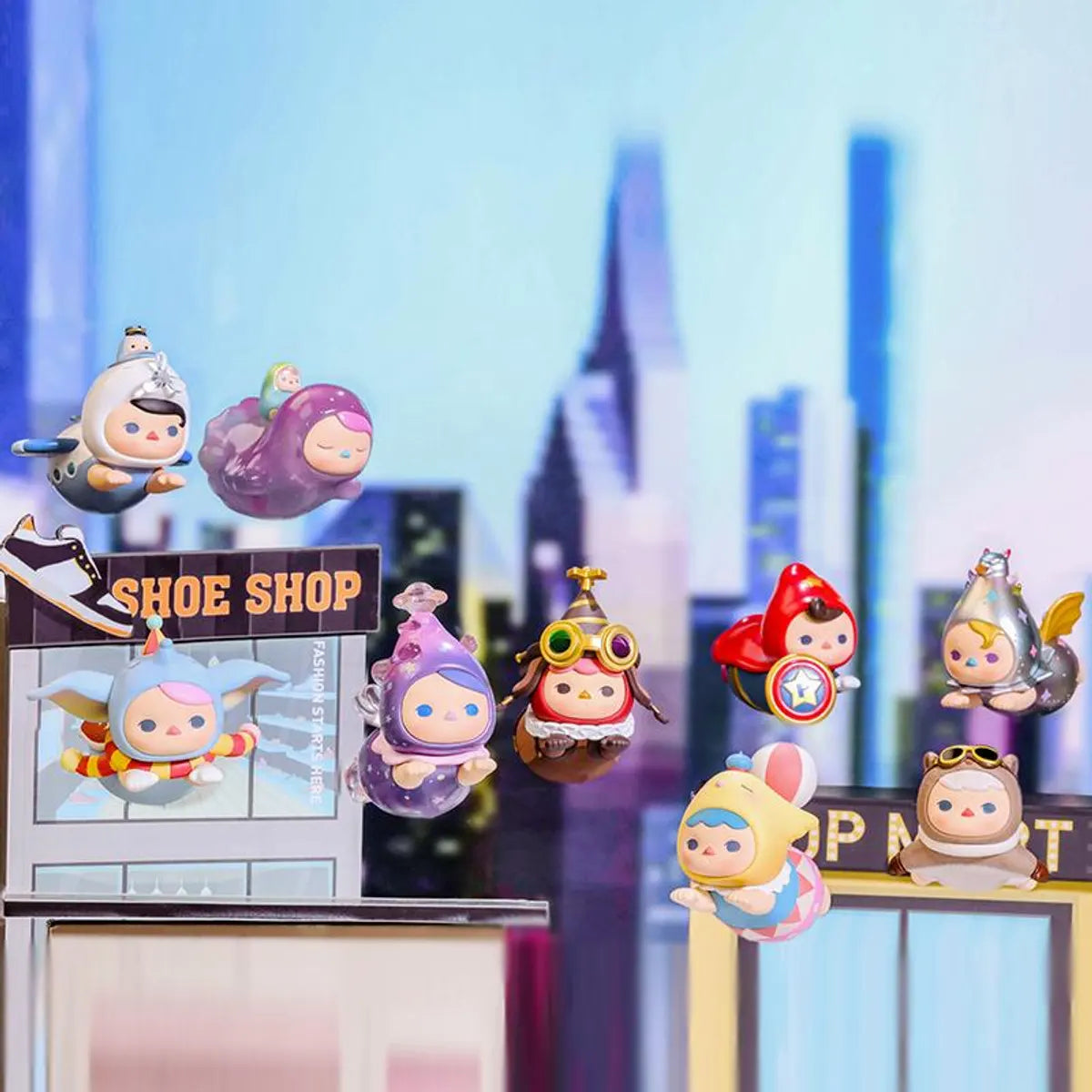 Group display of all Pucky Flying Babies vinyl figures soaring together.