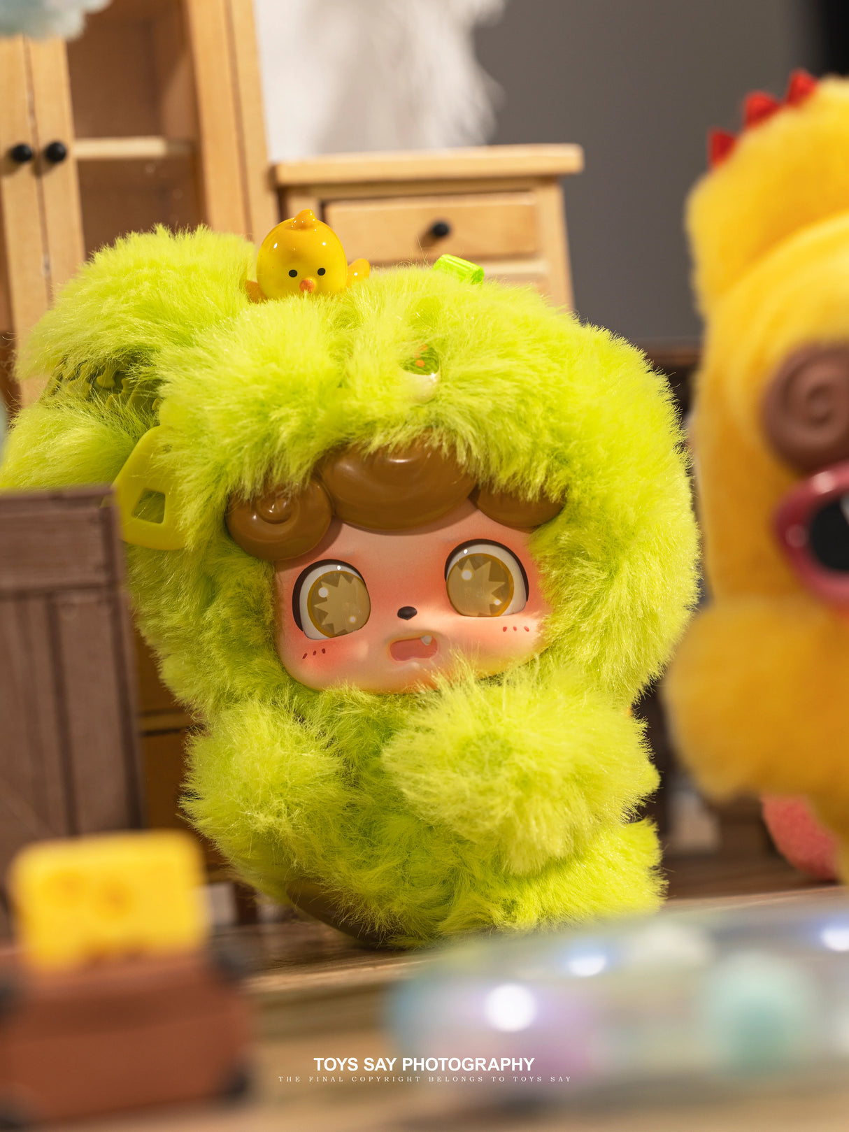 Q Kid Emotional Hairy Monsters green Curiosity character with chick detail