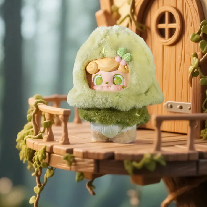 Q.Kid Fairy Tales plush figure in green hood standing on a wooden treehouse