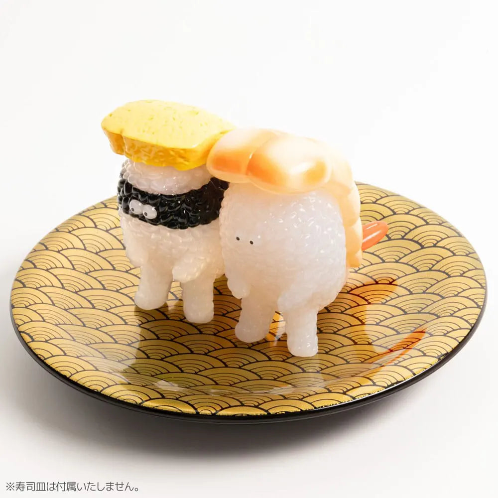 Egg sushi monster twin set on sushi standing on plate