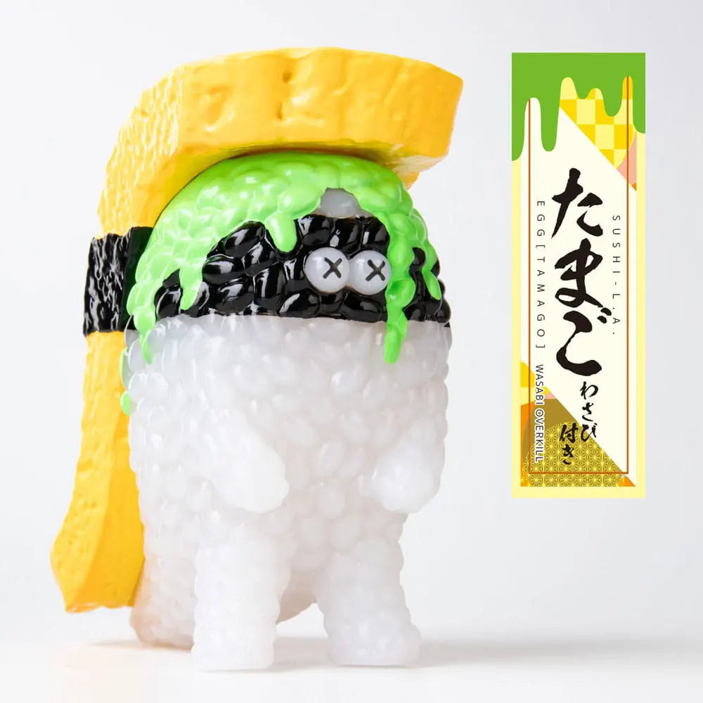 Wasabi-covered egg sushi monster with X eyes