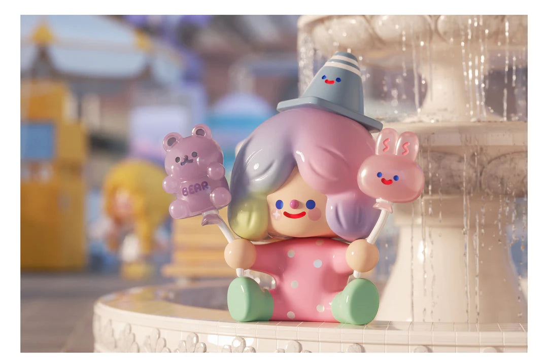 Bubble Master RiCo figure sitting beside a decorative fountain