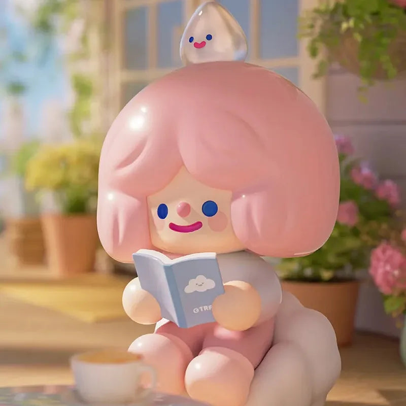 Happy Room Tour collectible vinyl figure reading a book with a raindrop accessory on head