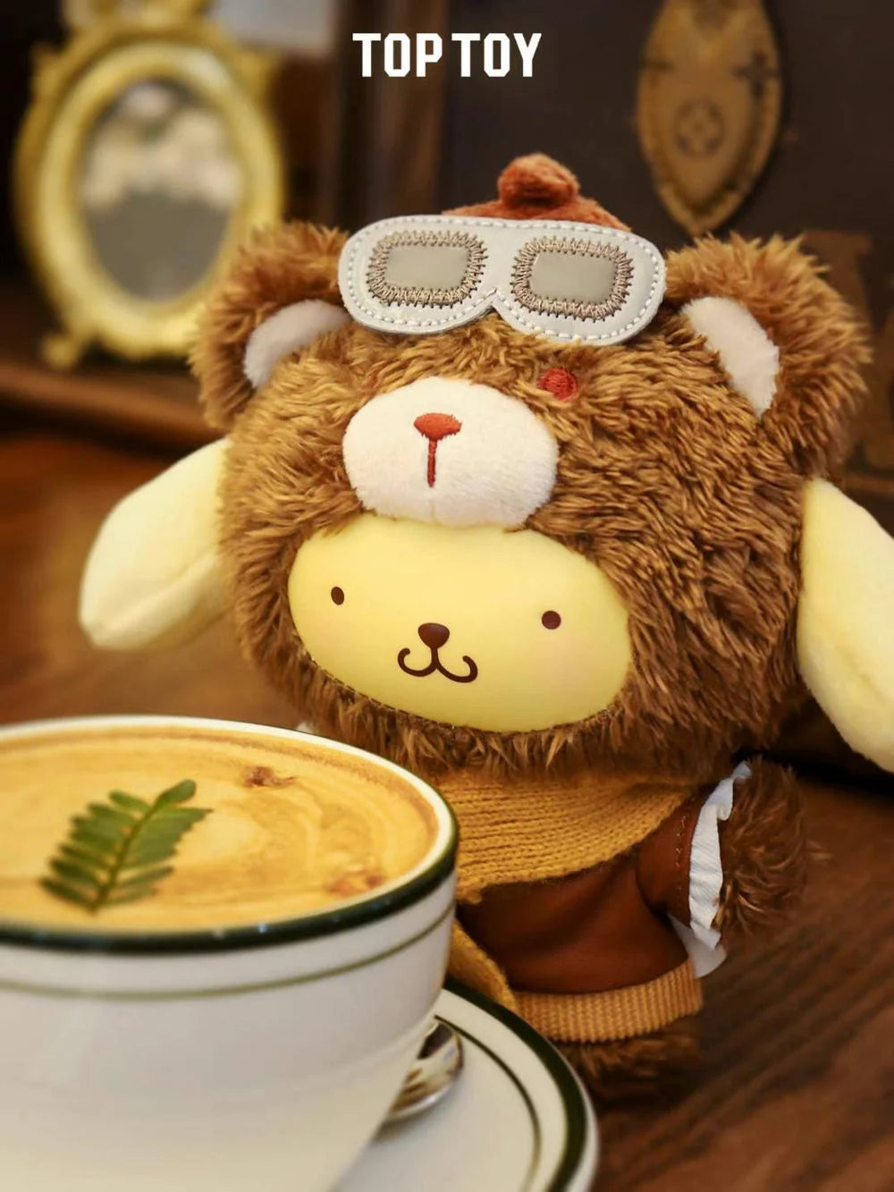 Pompompurin Sanrio Afternoon Tea plush keychain with goggles and brown bear outfit