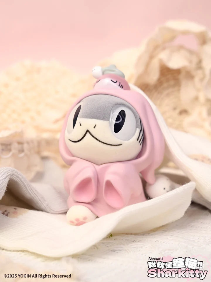 Sharkitty blindbox vinyl figure in pink hoodie with tiny fish on head
