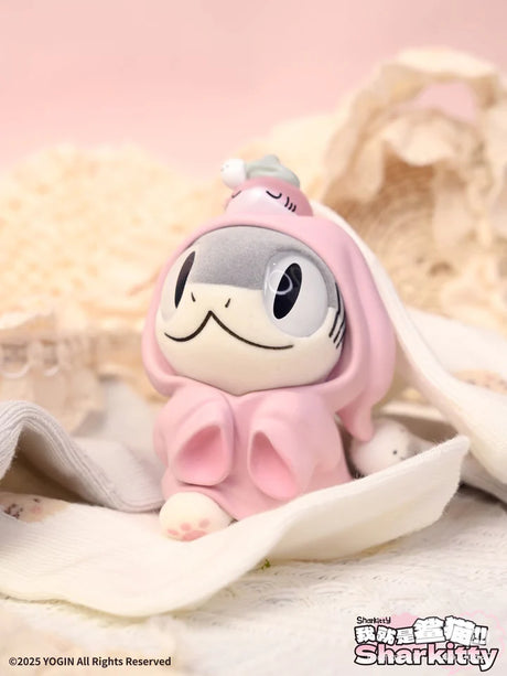 Sharkitty blindbox vinyl figure in pink hoodie with tiny fish on head