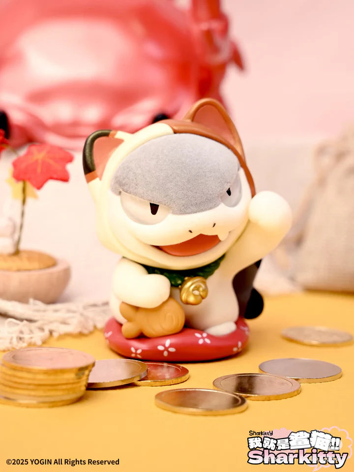 Lucky Sharkitty blindbox vinyl figure sitting with gold bell and coins